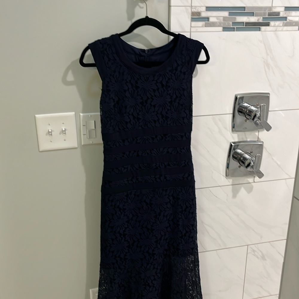 Navy blue lace dress with cap sleeves. Size 6